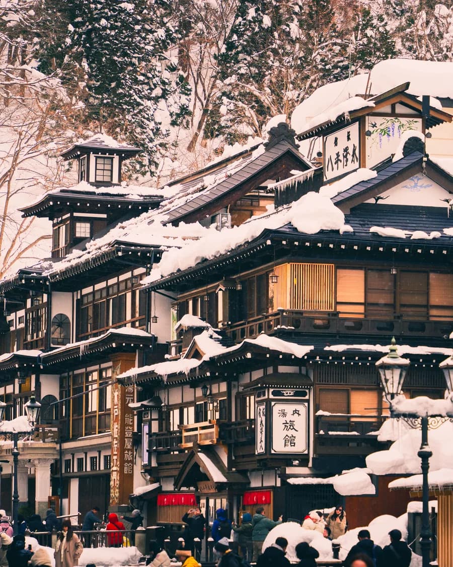 Snow-covered buildings in Ginzan Onsen, a hot spring town in Yamagata, Japan